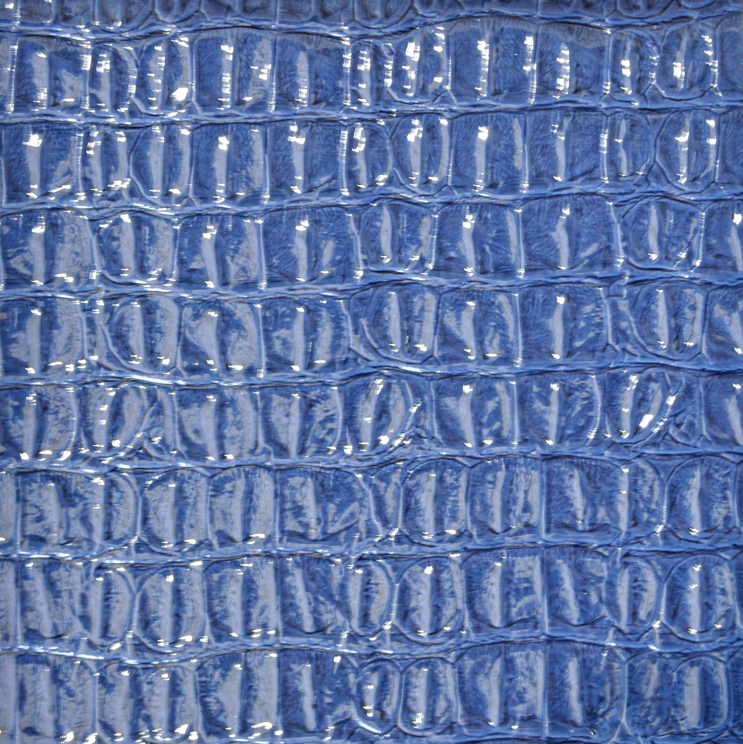 Faux crocodile vinyl in navy blue for upholstery and crafts