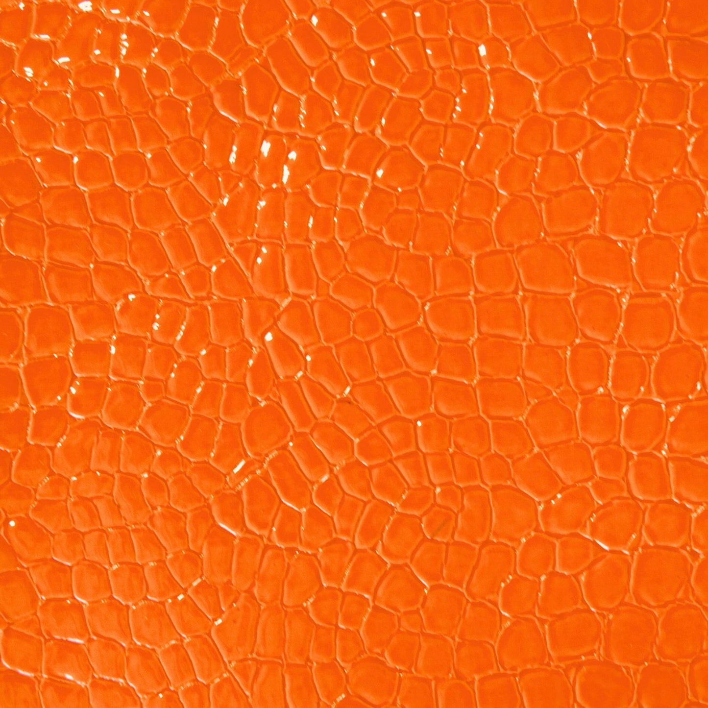 Faux snake vinyl in orange for upholstery and crafts