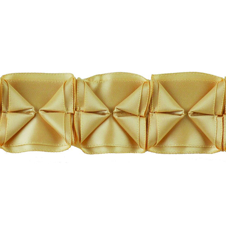 A 10-yard roll of box pleated ribbon in mocha color.