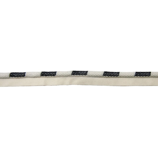 Close-up of a cream cord with black checkered pattern on a white background