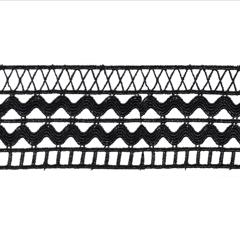 A close-up image of a black Venice lace trim with a distinctive pattern.