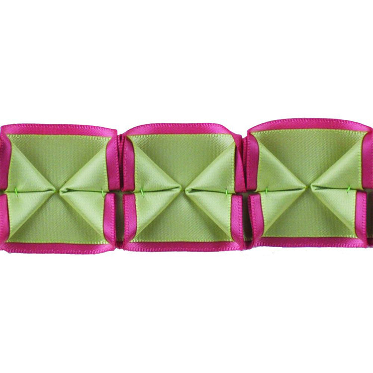 A series of box pleated ribbons in dusty rose and mint colors, arranged in parallel.