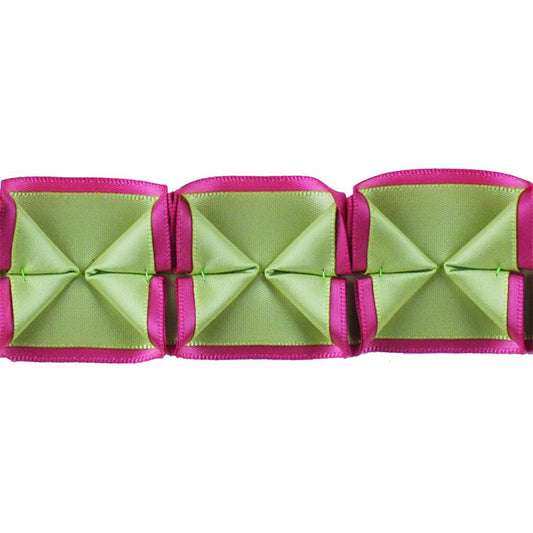 A series of box pleated ribbons in dusty rose and mint colors, arranged in parallel.