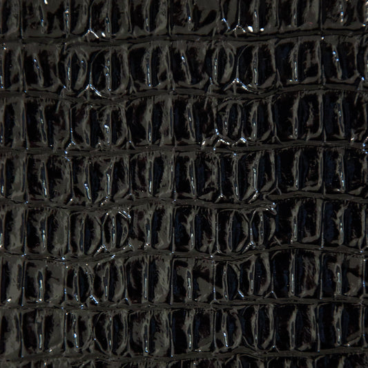 Faux crocodile vinyl in black for upholstery and crafts