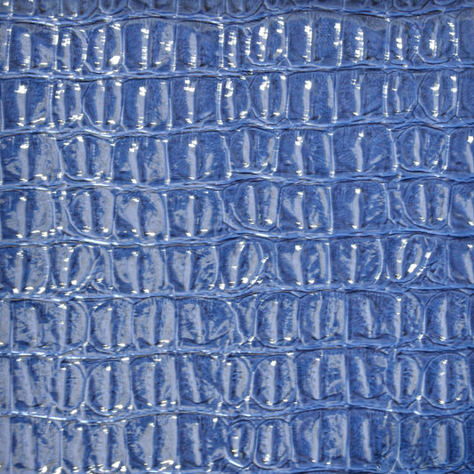 Faux crocodile vinyl in navy blue for upholstery and crafts