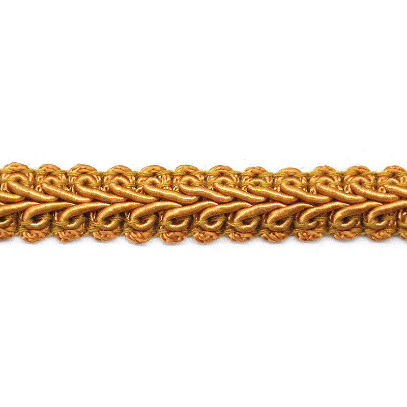 A close-up image of a antique gold colored French gimp trim, showing an intricate chain-like pattern.