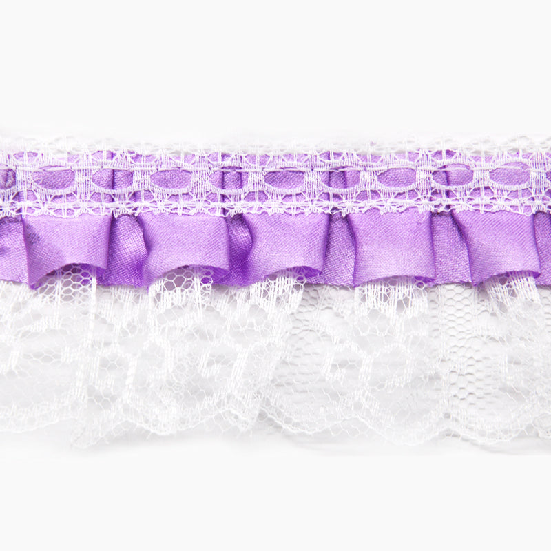 A 2-inch wide gathered lace with satin edge trim in lilac color, shown in a 50-yard roll.