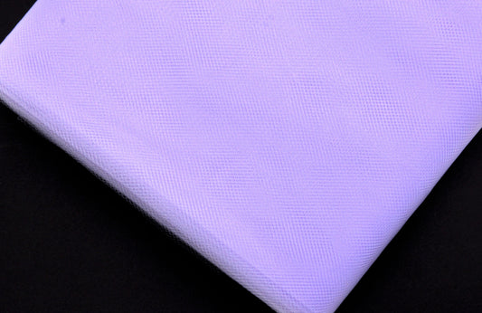 A bolt of lilac-colored tulle fabric.