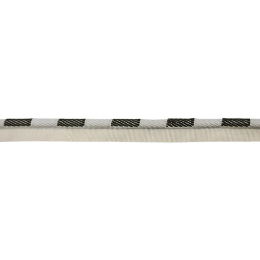 Close-up of a white rope with olive green and cream pattern on a white background