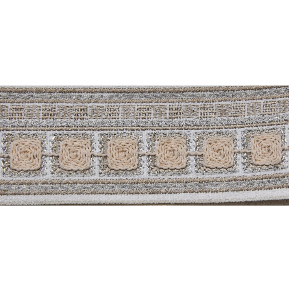 Textured ribbon with woven pattern on a beige and silver background. 2.25in.